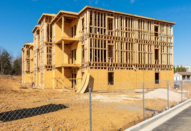 a snapshot of temporary chain link fences protecting a large construction project from unauthorized access in Irvington NJ